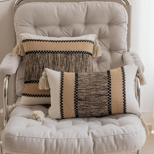 Khaki pixel-knit pillowcases with tassels