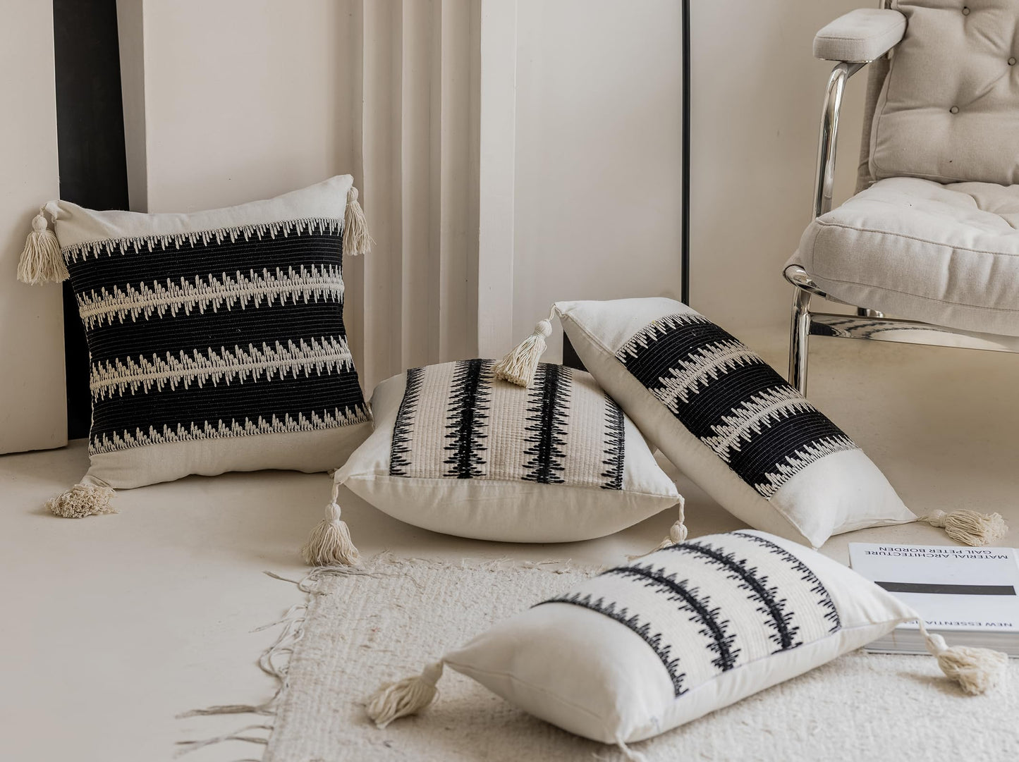 Black leaf-patterned pillowcases with tassels