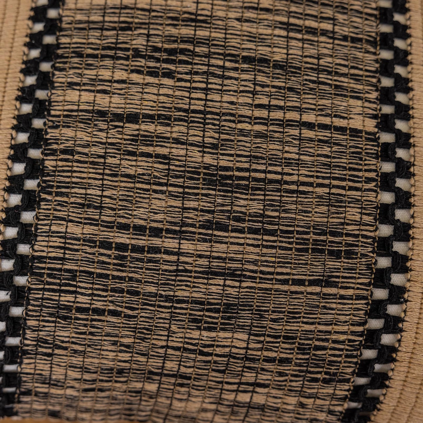 Khaki pixel-knit pillowcases with tassels