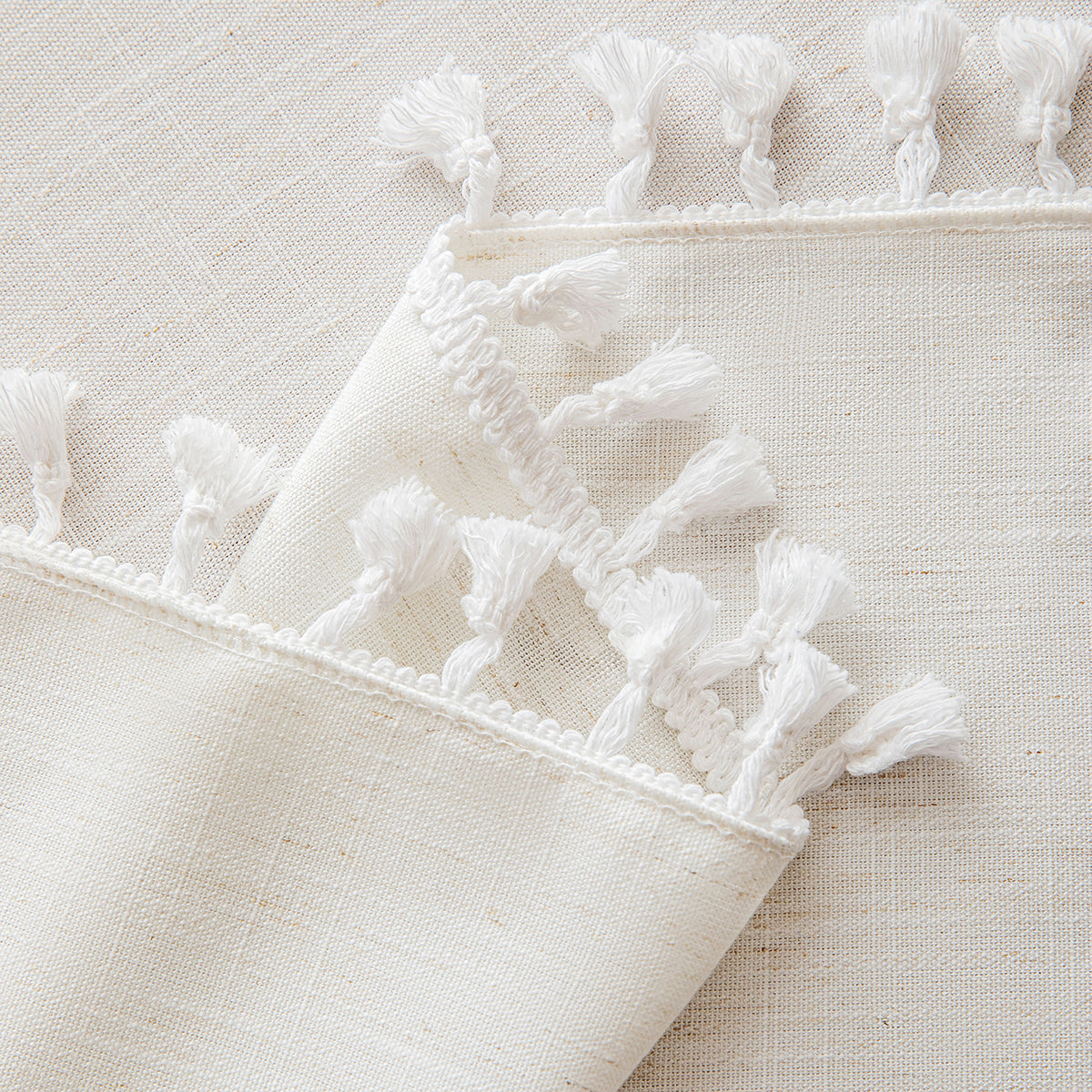 Poly-Linen Solid-Color Tablecloth with Tassel Trim in White