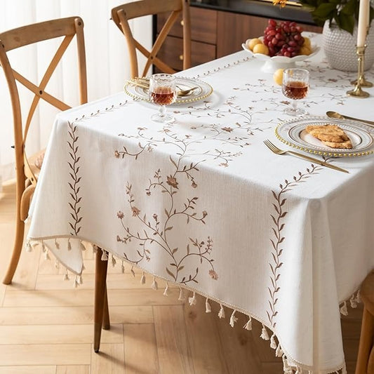 Cotton and linen tablecloth with curry roses on white background