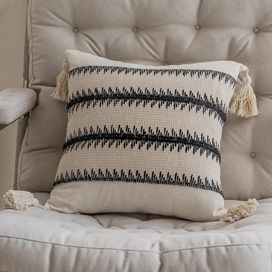 Black leaf-patterned pillowcases with tassels