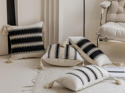Black leaf-patterned pillowcases with tassels