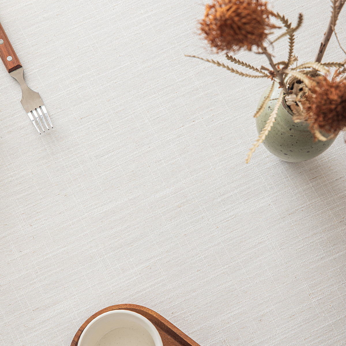 Poly-Linen Solid-Color Tablecloth with Tassel Trim in White