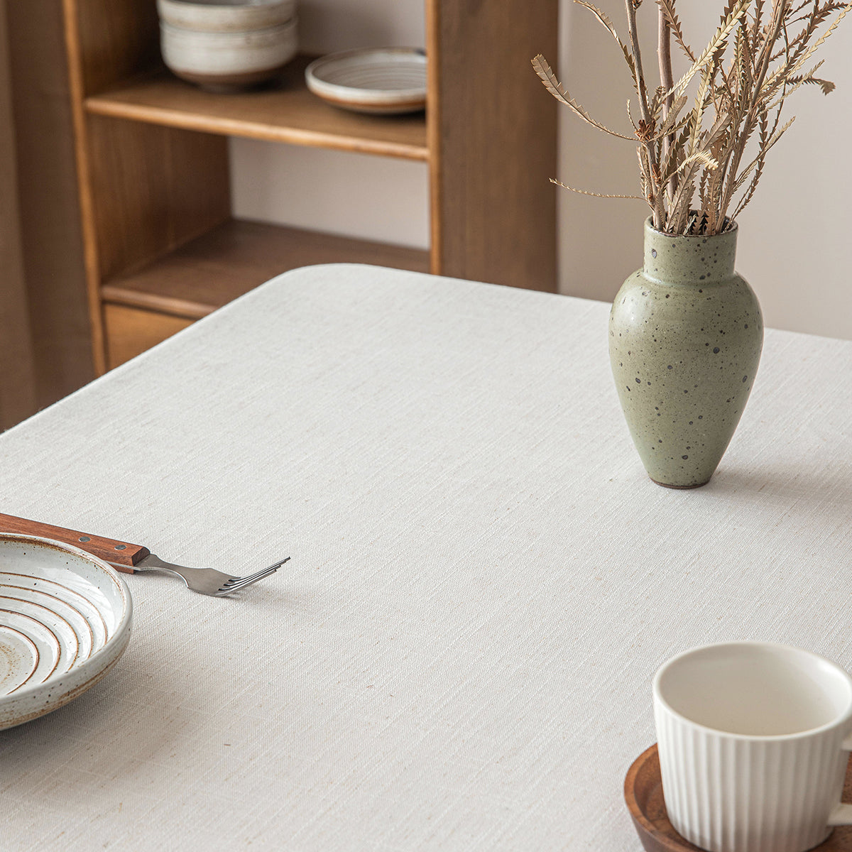 Poly-Linen Solid-Color Tablecloth with Tassel Trim in White